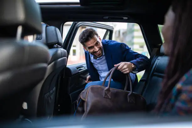 Passenger Entering Car